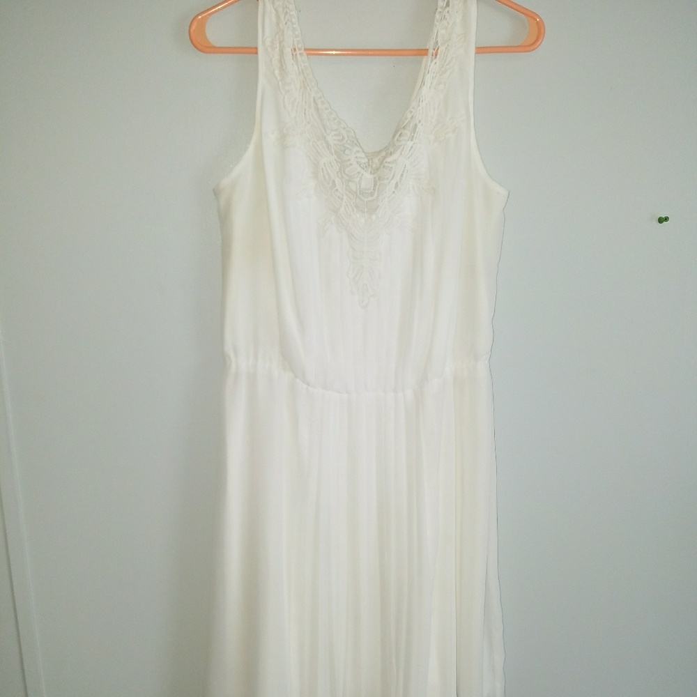 white pledded dress